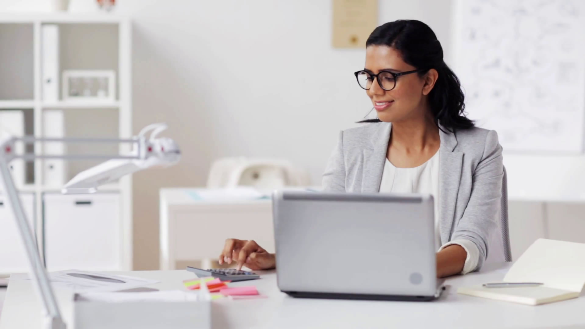Accountant at computer working on taxes